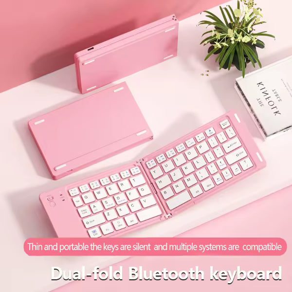Clavier Bluetooth pliable blanc - vue ouverte sur bureau avec smartphone