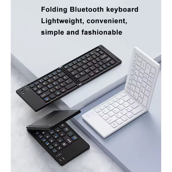 Clavier Bluetooth pliable rose - vue ouverte sur bureau avec smartphone